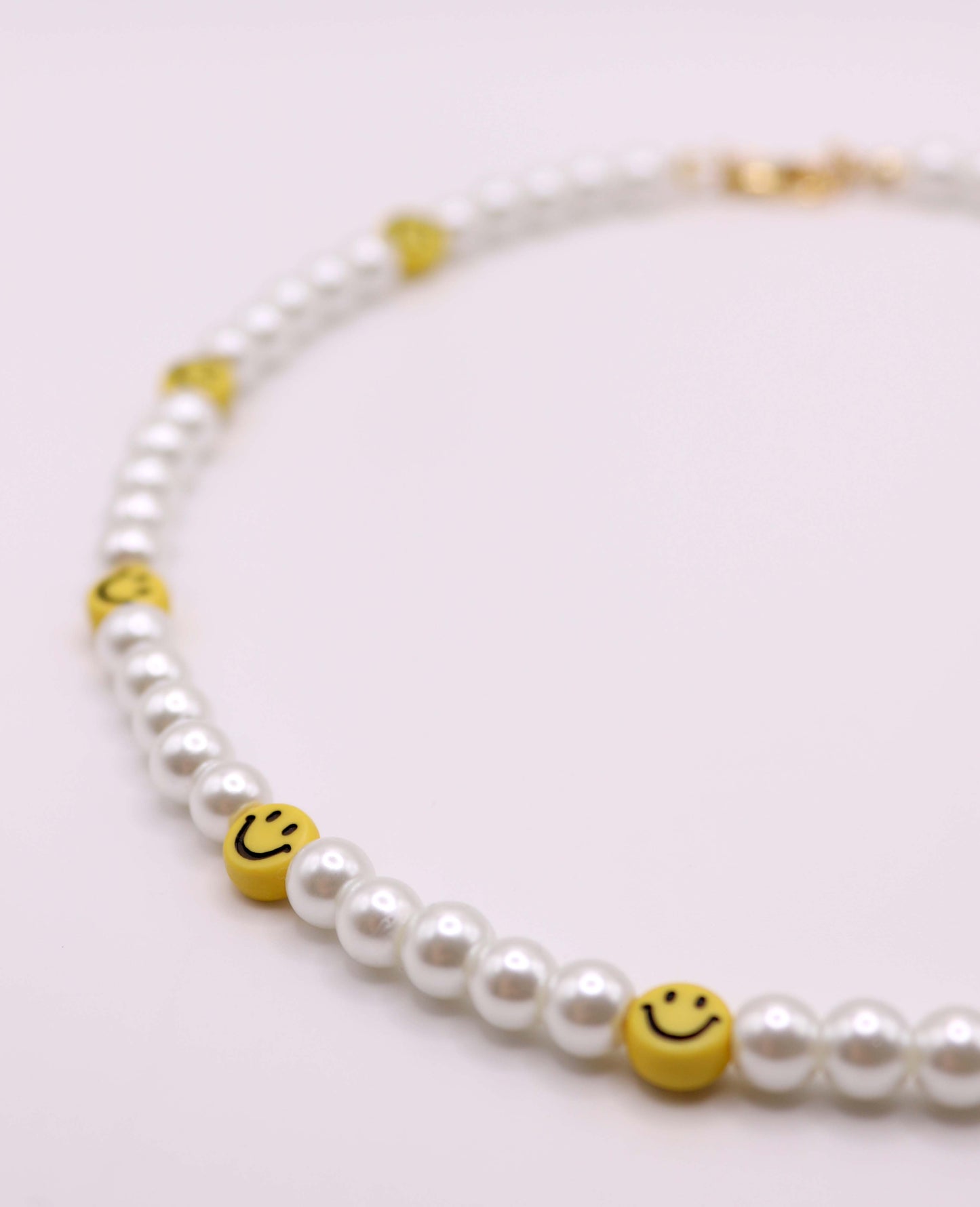 Kette mit gelben Smileys